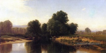 Bétail au bord de la rivière Alfred Thompson Bricher Peinture à l'huile